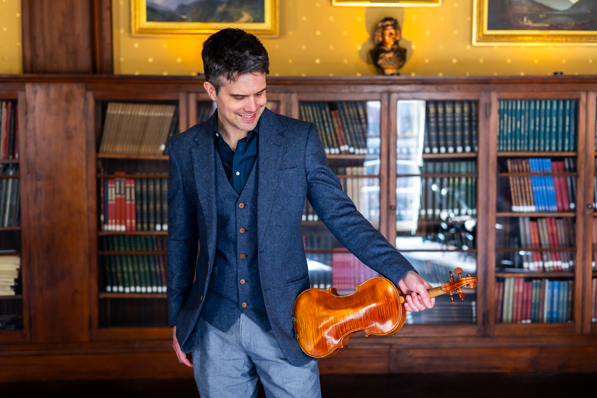 Nathan Gourley with fiddle, candid